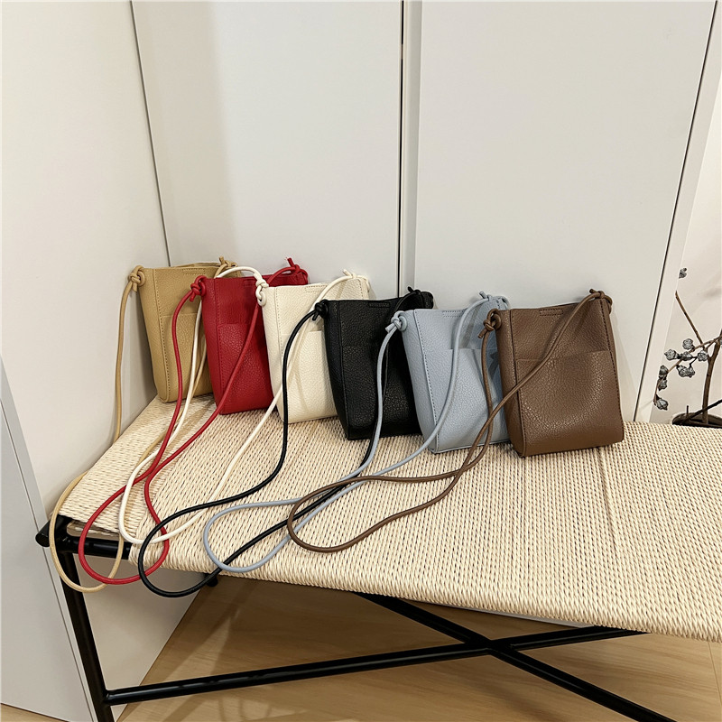 小脏柜 2026新款韩国小众ins迷你软皮散步手机包轻便单肩斜挎小包