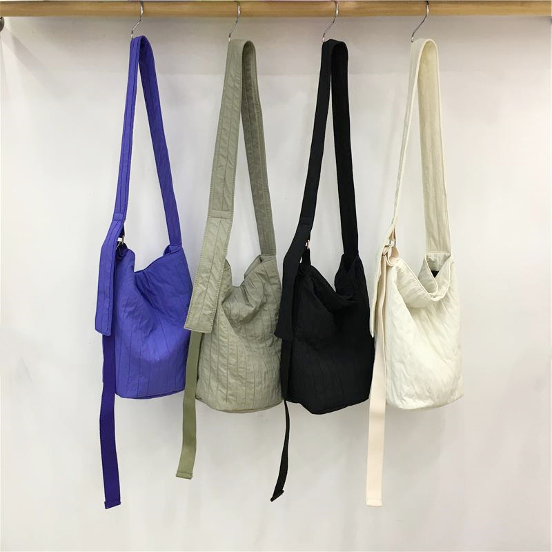 小脏柜 日系文艺小清新夏季多巴胺休闲可爱尼龙单肩斜挎小水桶包