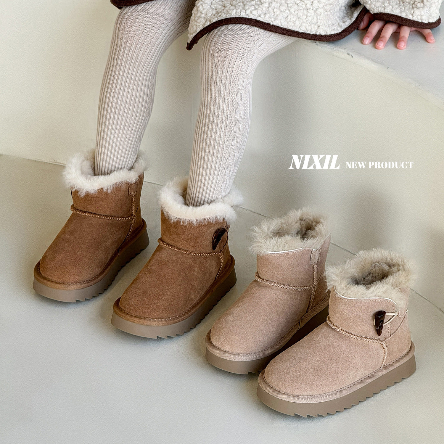 时尚牛角扣儿童磨砂真皮雪地靴2025冬新款防滑男女保暖真毛大棉靴