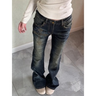 美式vibe复古水洗十字架铆钉微喇牛仔裤女2026春季新款直筒长裤子