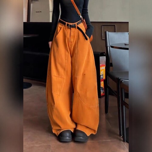 橘色弯刀牛仔裤女2026新款春秋季宽松显瘦多巴胺版型超好看的裤子