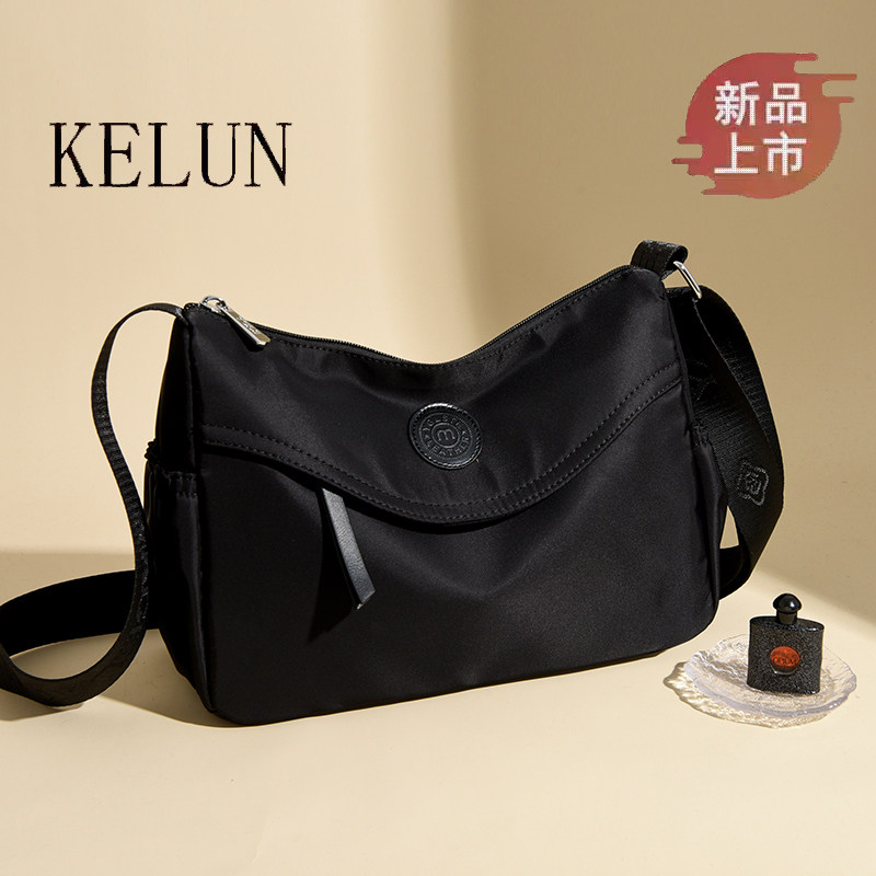 2026春季新款月牙包牛津布女包大容量防水斜挎包女通勤单肩包黑色