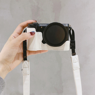 适用索尼黑卡7皮套A5100底座A5000可爱相机包RX100保护壳粉色肩带