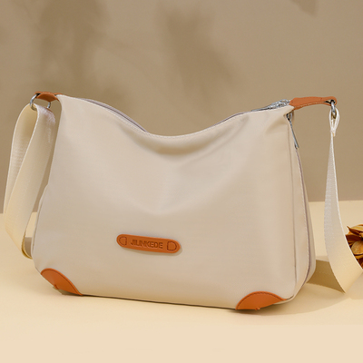 休闲百搭斜挎包女时尚轻便单肩尼龙布2024新款大容量简约帆布包