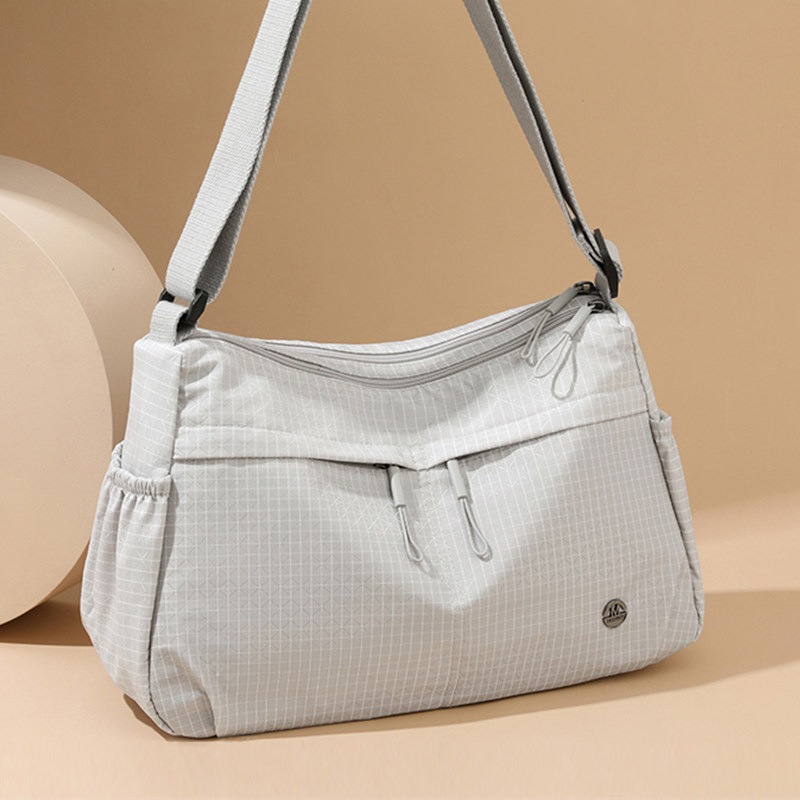 大容量斜挎包女新款上班通勤单肩包轻便旅行帆布挎包多层流浪包,箱包皮具/热销女包/男包,通用款女包,淘宝优惠券,粉丝福利购,淘宝优惠卷