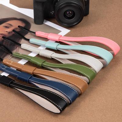 适用佳能R50手腕带富士XT30IIXS20XT50手绳索尼ZVE10二代A7C2配件