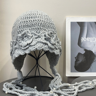 复古川西手工钩花珍珠流苏毛线帽女秋冬草原保暖拍照护耳雷锋帽子