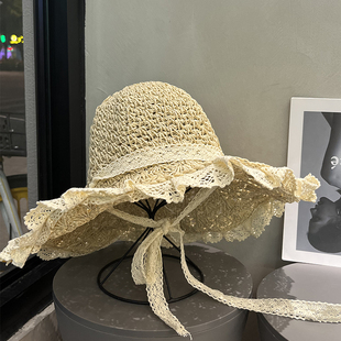 大帽檐镂空纸草防晒帽女夏旅游海边沙滩遮阳帽潮蝴蝶系带拍照帽子