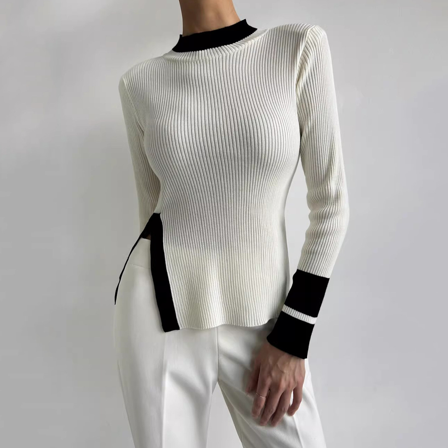 设计感撞色拼接半高领侧开叉长袖针织衫女早春季新款宽松百搭毛衣,女装/女士精品,毛针织衫,淘宝优惠券,粉丝福利购,淘宝优惠卷