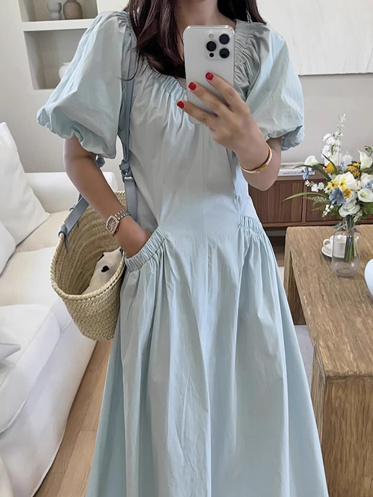 褶皱V领大口袋泡泡袖连衣裙
