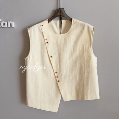 【念念】2025嫩黄白彩扣马甲半裙不规则马甲马面裙套装iu1928