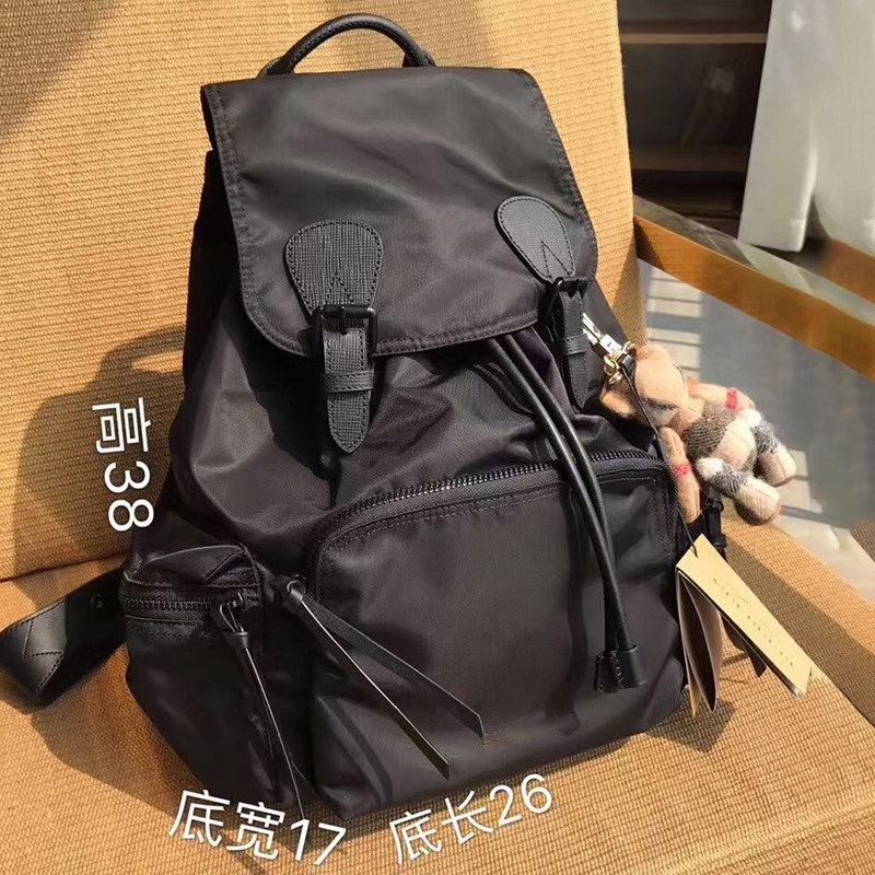 潮男士大号容量休闲背包纯色防水尼龙旅行包轻便军旅电脑家双肩包