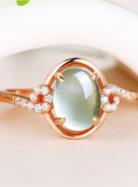 s925银镀玫瑰金四爪戒指绿宝石