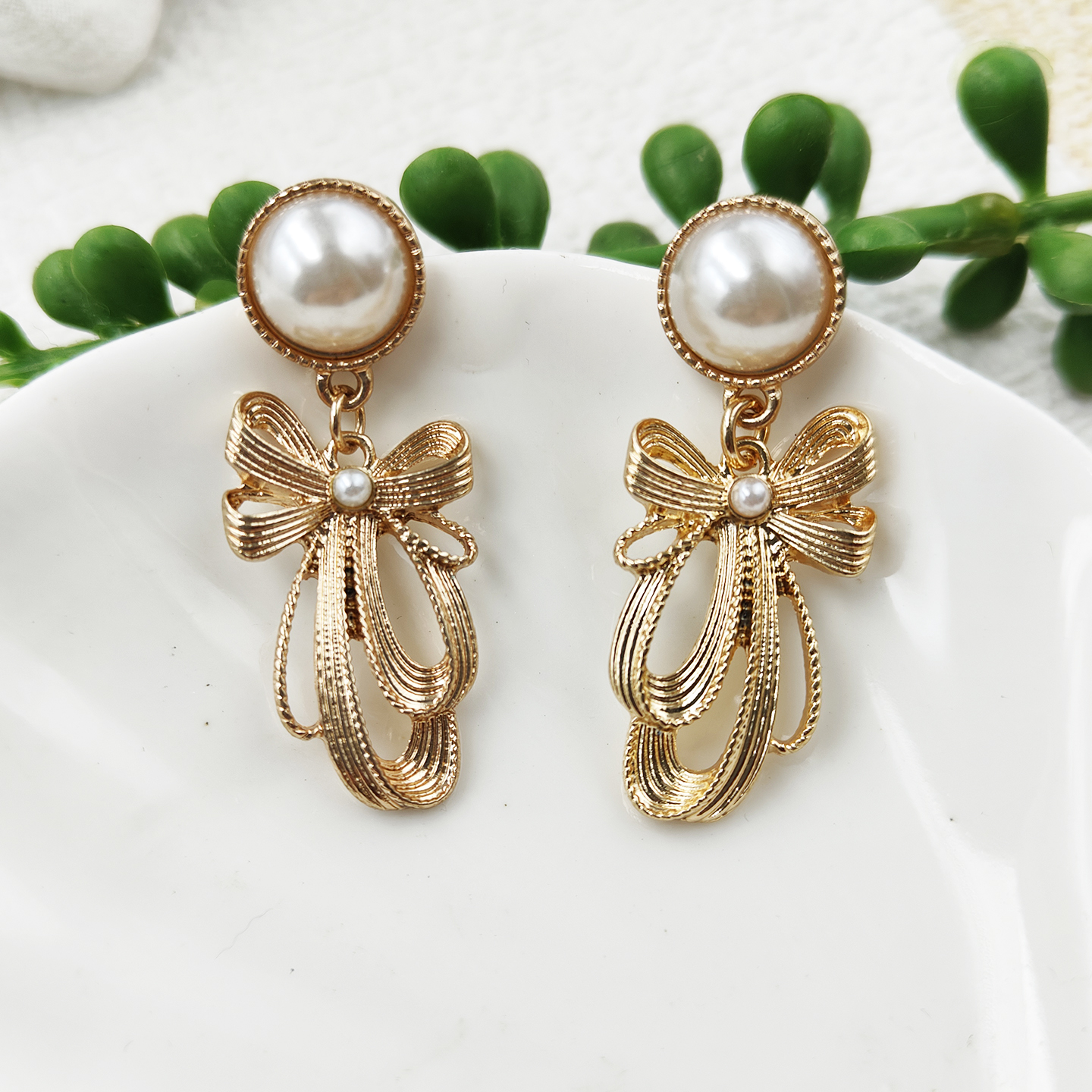 新款小众潮款蝴蝶结吊坠耳环个性时尚轻奢镀金复古耳饰女C452