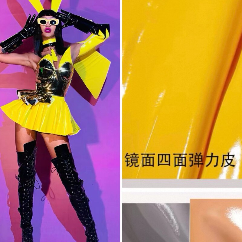 镜面四面弹力仿皮布料超亮面紧身皮裤防水舞台服装设计PU面料