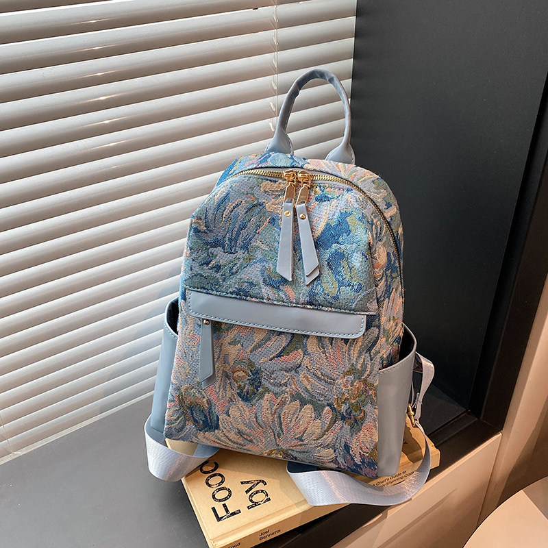 双肩包包女2025新款时尚印花大容量背包休闲潮流轻便背包通勤书包
