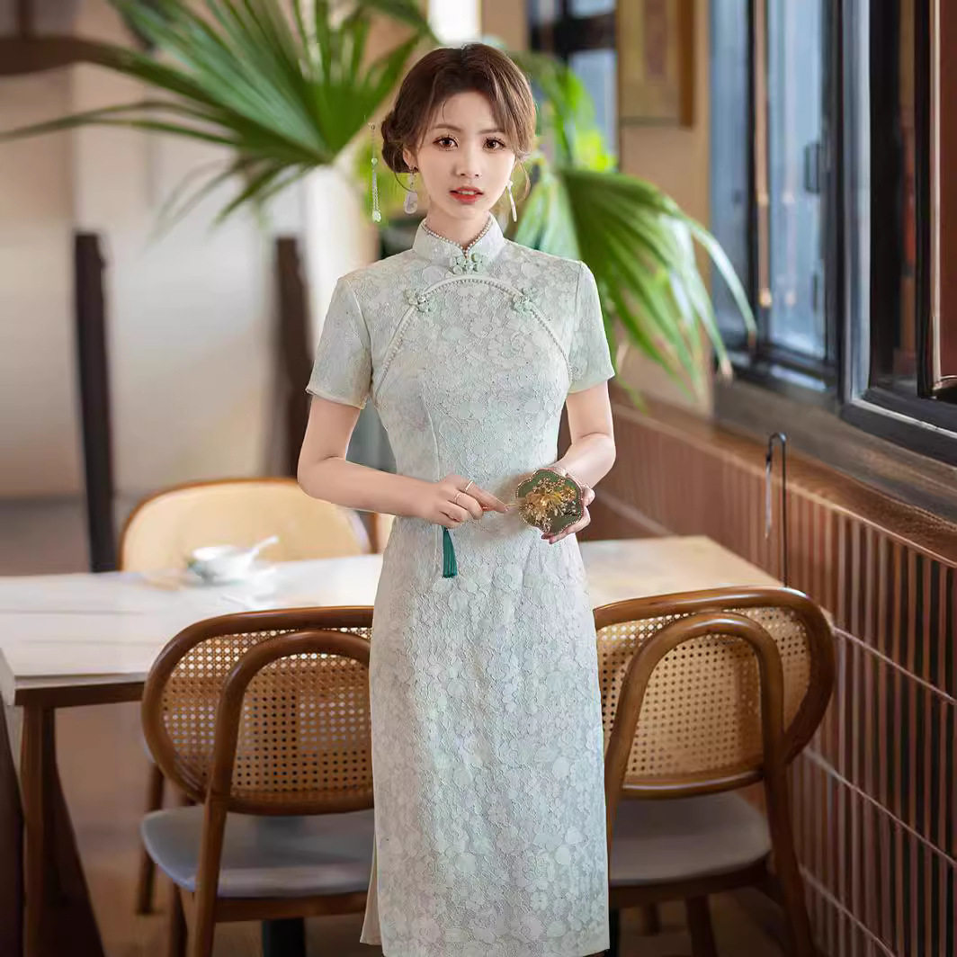 圆襟复合蕾丝中长款旗袍2026春夏季新款三分袖立领印花少女连衣裙