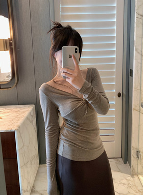 嘉言 简约气质扭结深V领性感针织衫2026春新款休闲修身长袖上衣