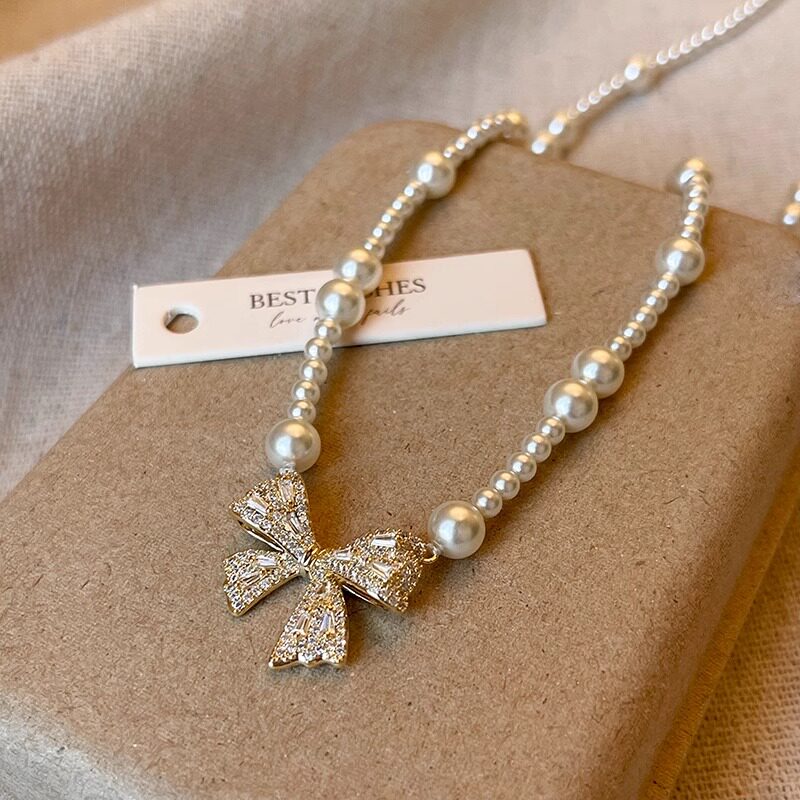 蝴蝶结吊坠珍珠项链女2025年新款高级感轻奢小众锁骨链颈链夏配饰