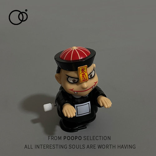 上发条边摇头边走路的小僵尸玩具