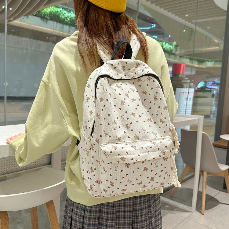 双肩包女学生ins百搭出去玩可爱印花灯芯绒大学生简约轻便书包图片