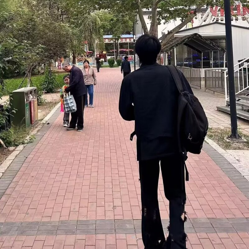 复古纯色破洞毛边黑色乞丐牛仔裤男女直筒显瘦宽松微喇叭裤做旧