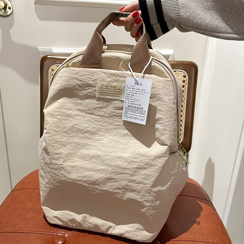 红鹮鸟轻便背包通勤双肩包女包包大容量男学生书包登山电脑旅行包