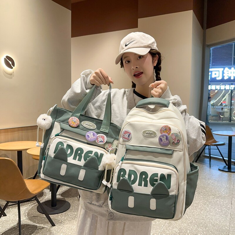 书包初中女生小学生双肩包大容量减负护脊高颜值女孩可爱百搭背包