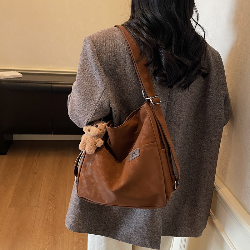 红鹮鸟复古双肩包包女2026新款高级感单肩包大容量通勤斜挎