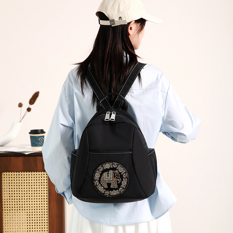 红鹮鸟双肩包女时尚休闲大容量背包旅行质感轻便防水新款书包百搭