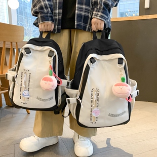 宽肩带书包女初中生高中生大容量潮牌背包男轻便简约大学生双肩包