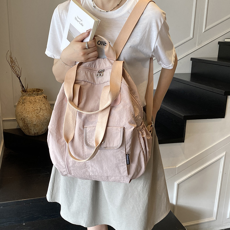 红鹮鸟大容量通勤女款双肩包