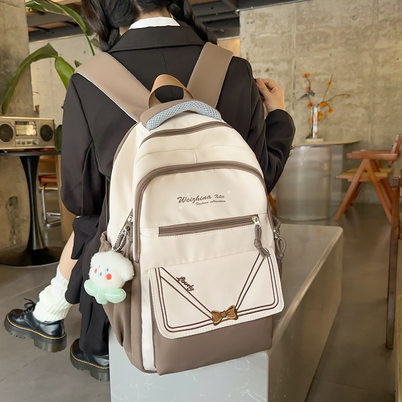 女孩书包女生小学生高颜值旅行包轻便初高中女双肩包超轻简约背包