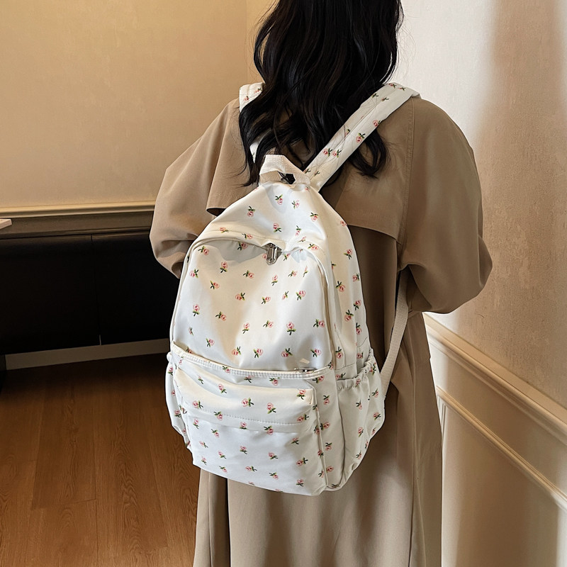 红鹮鸟清新花朵少女心校园双肩包