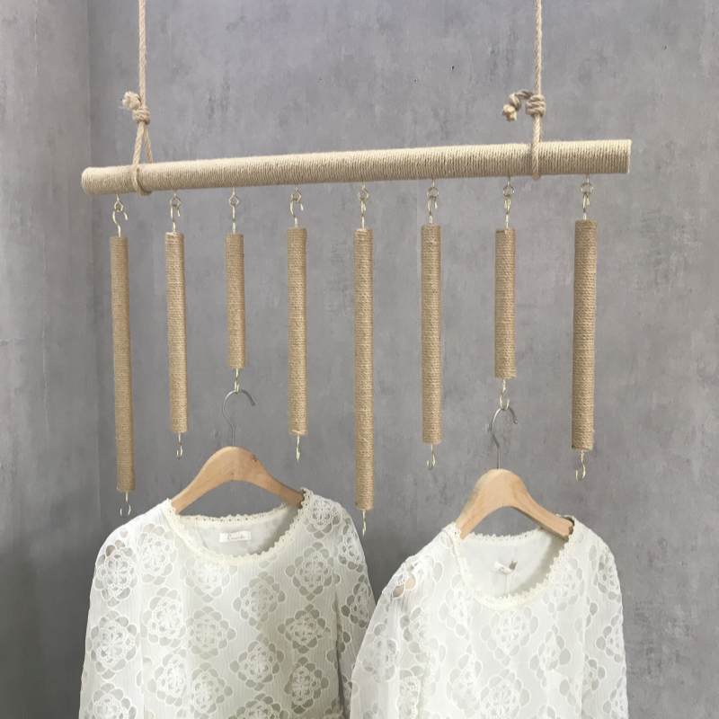 服装店展示架上墙树枝挂衣杆麻绳吊挂墙上挂衣架壁挂木童装店