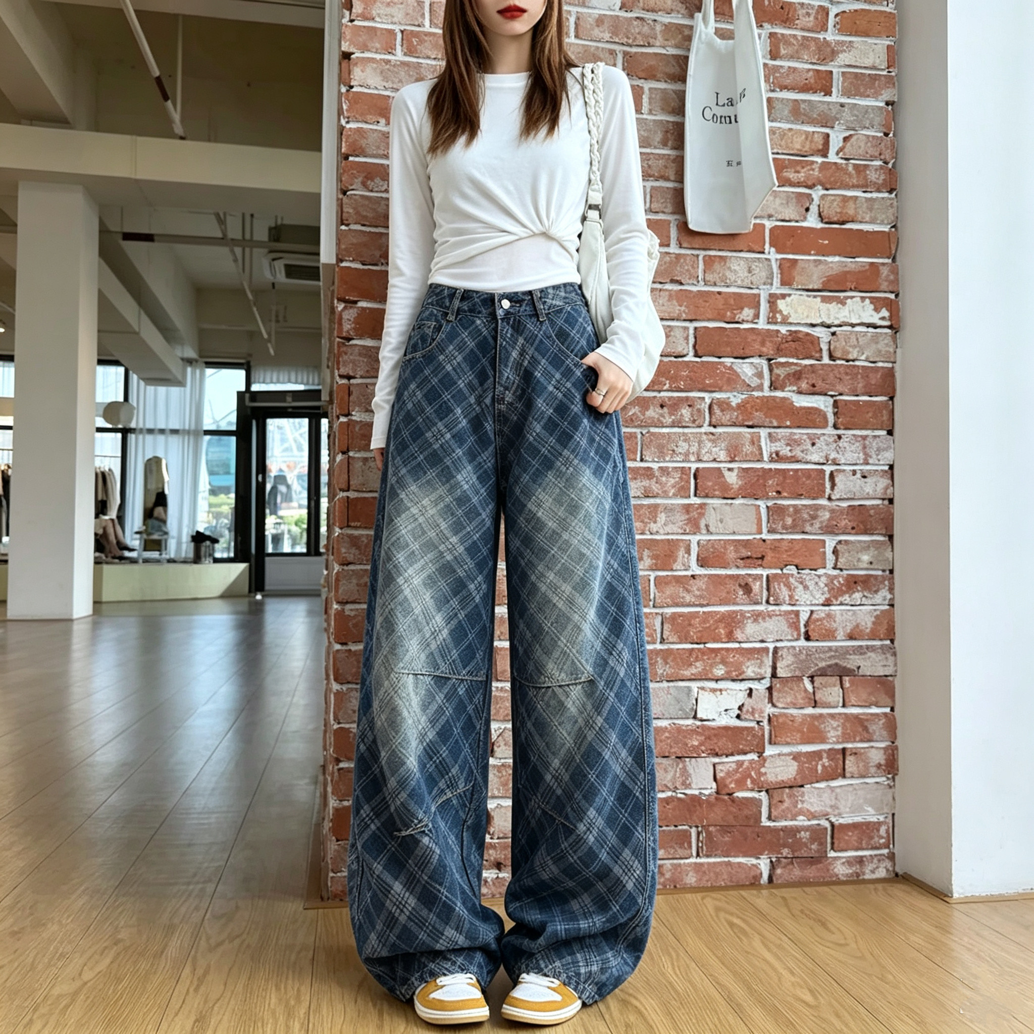 乔乔美式复古格纹弯刀牛仔裤女秋季秋冬2026新款水洗褶皱休闲长裤