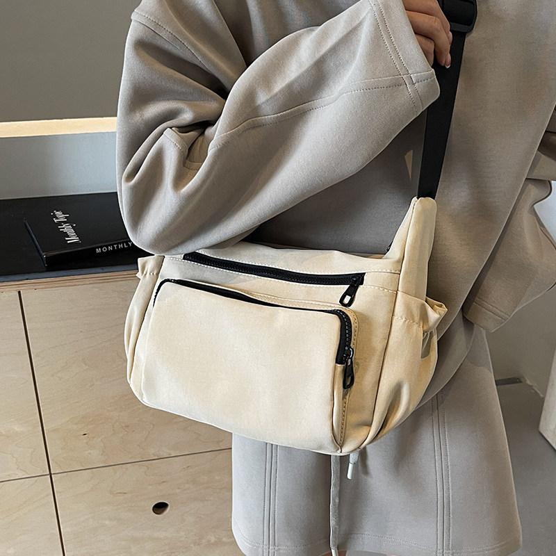 休闲包包女式2026新款流行大学生上课通勤布包单肩包大容量斜挎包