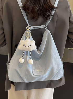 银色旅行双肩包女2025新款潮时尚单肩包大容量多用斜挎水桶包背包