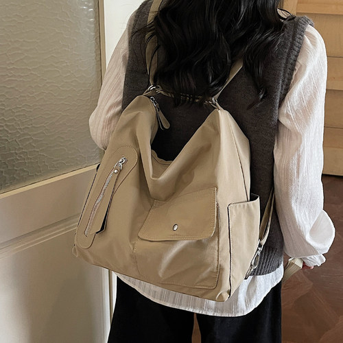 三用背包包女式2026新款休闲旅行双肩包大容量学生单肩斜挎水桶包