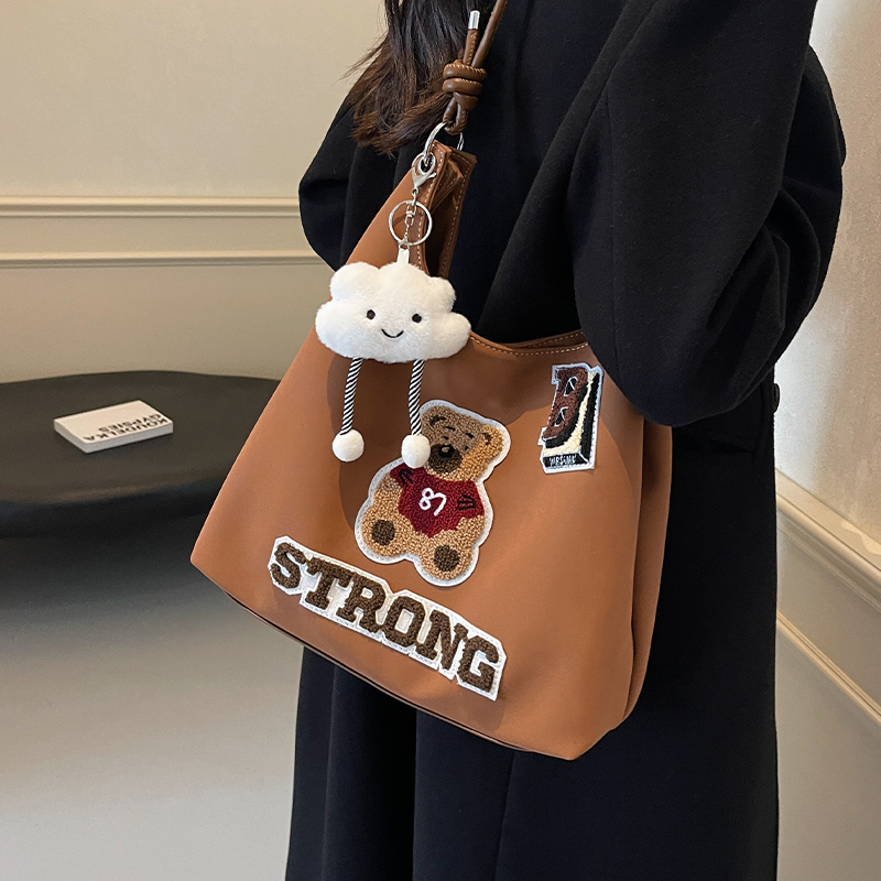 单肩包设计感卡通刺绣双肩包