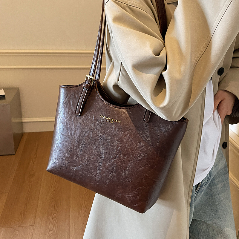 美拉德包包女式2025年夏季流行高级感单肩包大容量托特包通勤大包