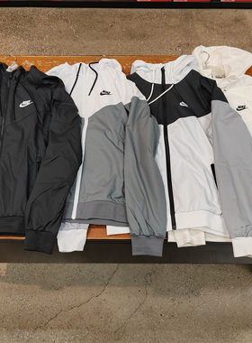 Nike耐克正品男女运动休闲外套梭织风行者冲锋衣连帽衫夹克727325