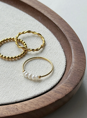 钛钢不掉色金色珍珠麻花细戒指女