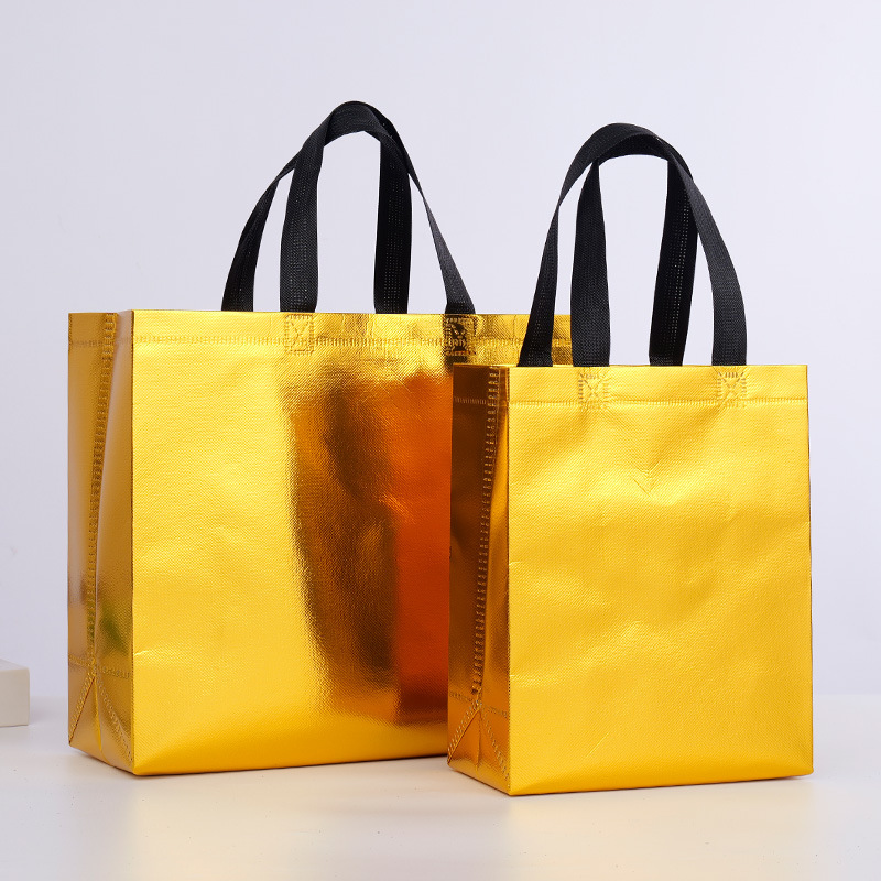 现货铝膜礼品服装袋无纺布袋子跨境定做环保镭射膜铝箔购物服装广