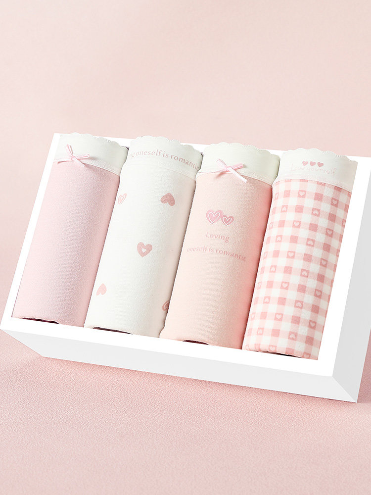 Set of pink and white women's underwear in a gift box