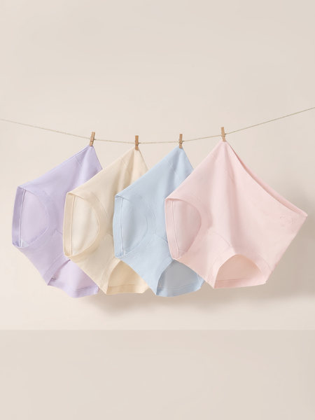Pastel colored seamless underwear displayed hanging on a line