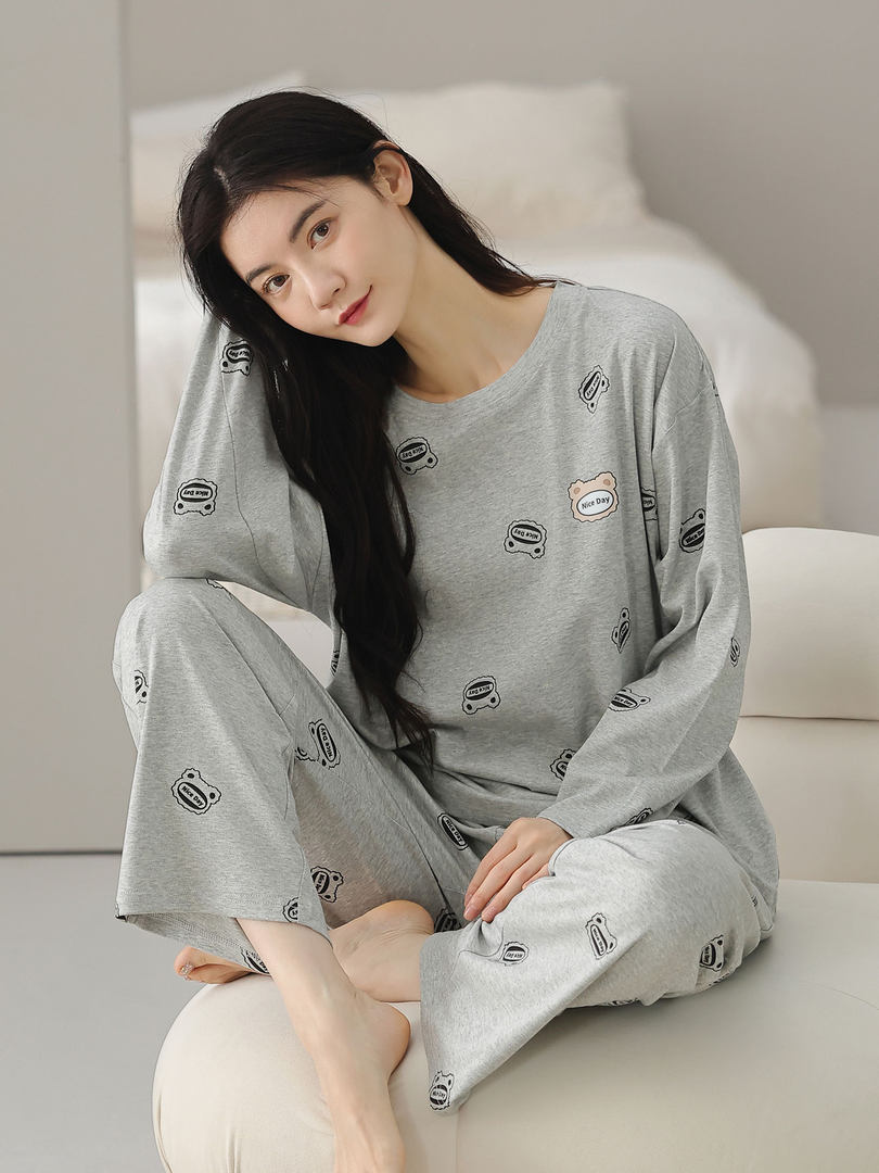Gray printed loungewear pajama set worn by a model