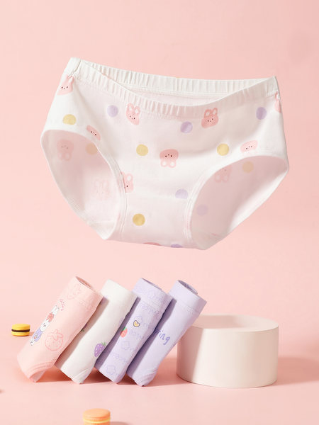 Pastel patterned women's underwear displayed on a pink background