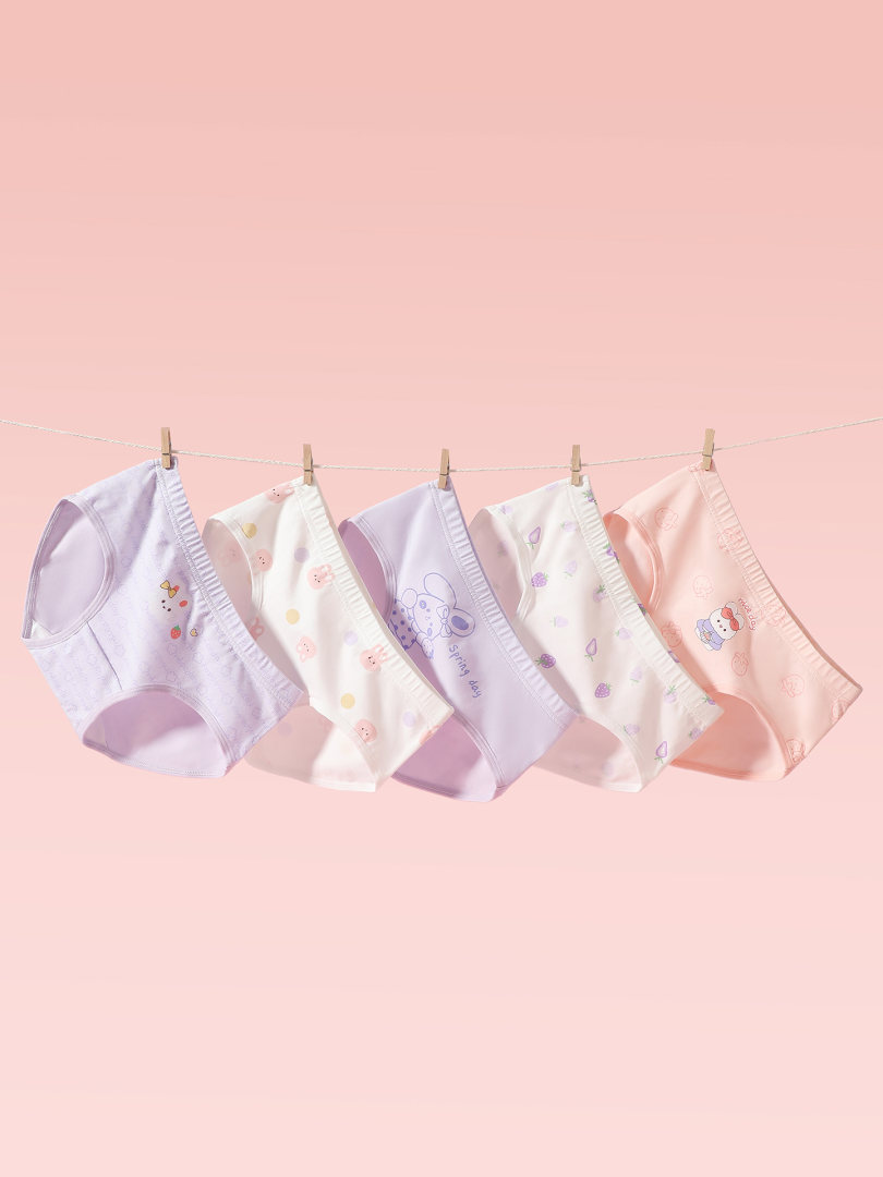 Pastel patterned women’s underwear briefs hanging on a clothesline