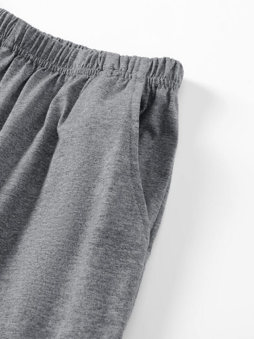Close-up of gray elastic-waist knit pants
